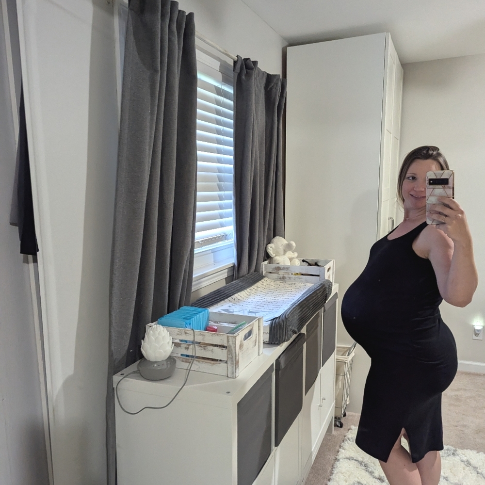Black sleeveless maternity dress